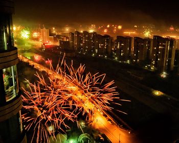 Firework display at night
