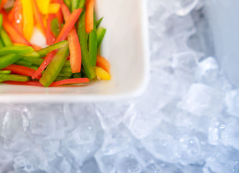 High angle view of chopped vegetables in plate