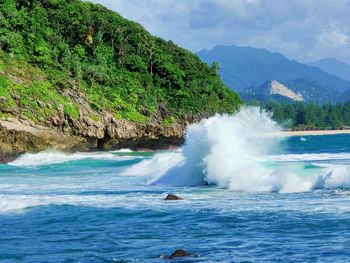 Scenic view of sea and mountains