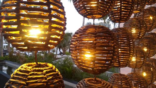 Illuminated lanterns hanging in city at night