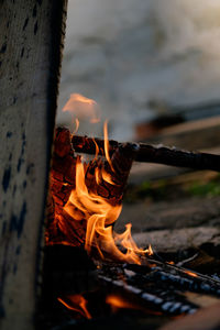 Close-up of fire on wood