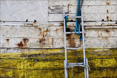 Abandoned building against wall