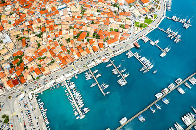 Aerial view of boats in harbor in lefkada city