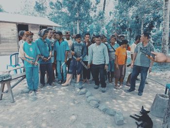 Group of people standing outdoors