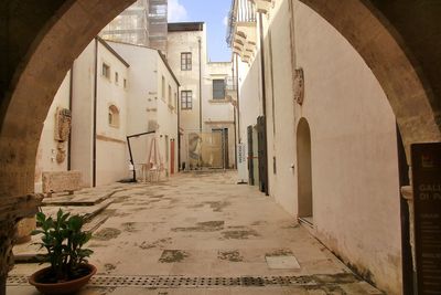 Alley amidst buildings in city