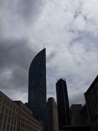 Low angle view of skyscrapers against sky