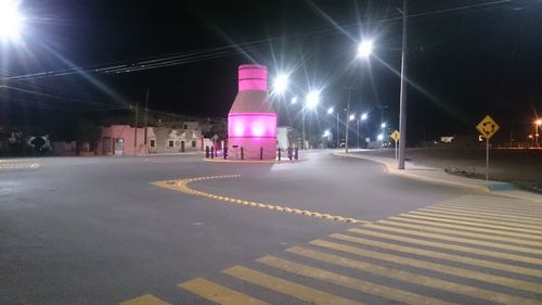 Illuminated street light at night