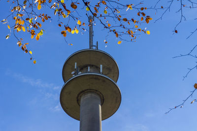 Low angle view of tower against clear blue sky