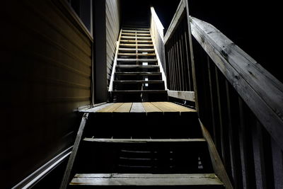 Empty steps by house at night