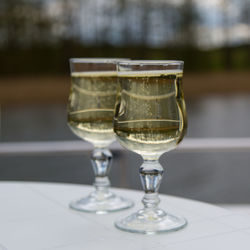 Champagne in glasses on table