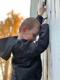 Full length portrait of boy standing outdoors