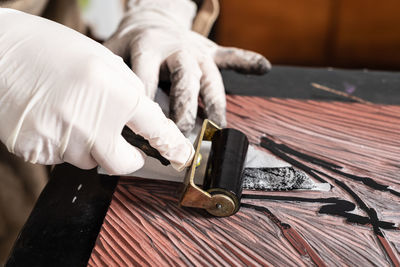 Midsection of person working on table