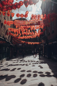 People in illuminated building