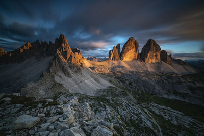 Scenic view of snowcapped mountains against sky during sunset