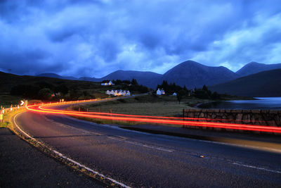 Light trails on road at night