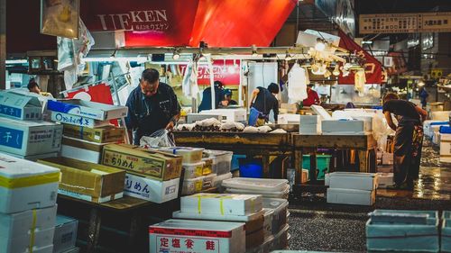 People at market stall