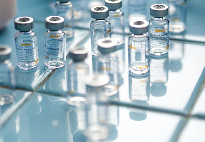 High angle view of bottles on table