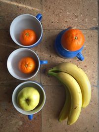 High angle view of fruits in bowl on table