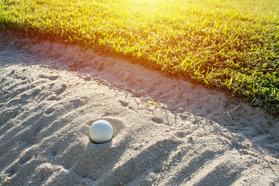 High angle view of sand on field