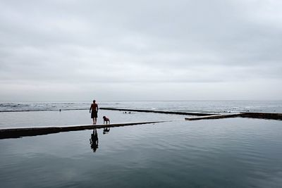 Man fishing in sea