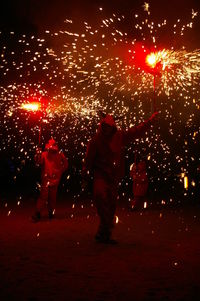 Firework display at night