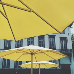 Yellow built structure against sky