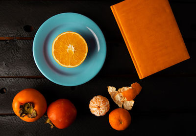 High angle view of orange fruit on table