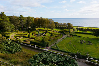 View over green garden of dunrobin castle in scotland 