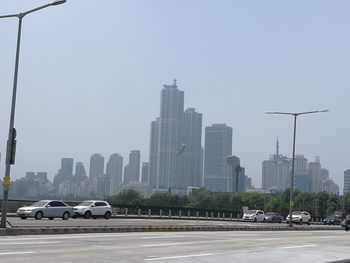 Cars moving on road in city