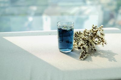 Close-up of glass jar on table