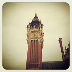 Low angle view of tower against sky