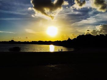 Scenic view of sunset over river