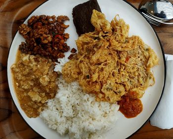 High angle view of breakfast served on table