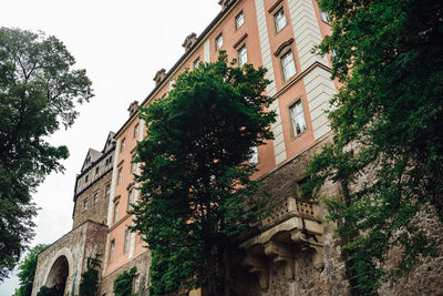 Low angle view of old building against clear sky