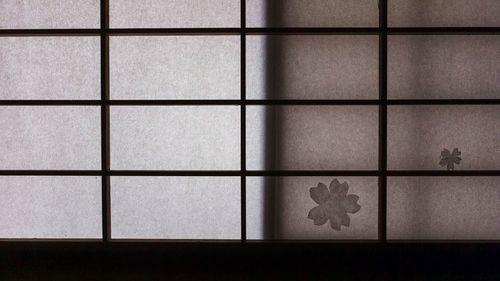 Close-up of floral pattern on glass window
