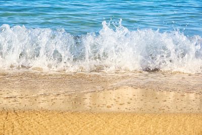 Waves splashing on shore