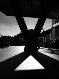 Silhouette bridge against sky
