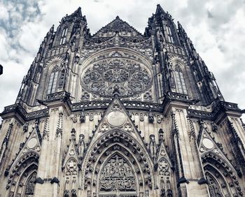 Low angle view of ornate building against sky