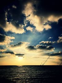 Scenic view of sea against sky at sunset