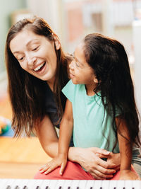 Portrait of a smiling girl looking away