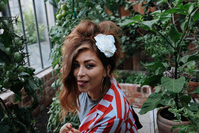 Portrait of smiling young woman outdoors