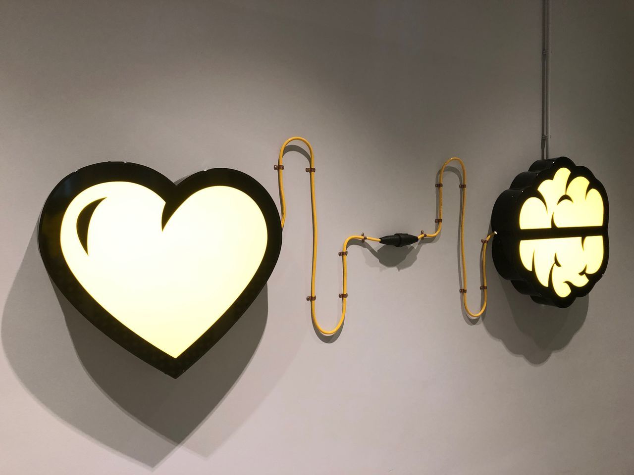 CLOSE-UP OF HEART SHAPE DECORATION HANGING ON CEILING