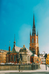 View of buildings in city against sky