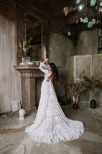 Woman standing on white floor