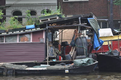 Boats moored in canal