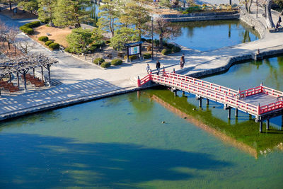 High angle view of swimming pool by lake