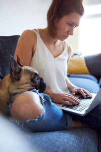 Young woman using smart phone