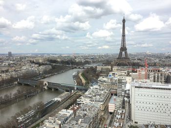 High angle view of bridge and cityscape against sky