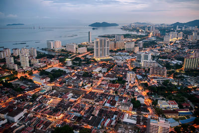 Aerial view of cityscape against sky