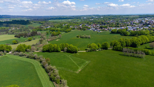 Aerial view of landscape in the eifel region with the city simmerath, forest and farmland